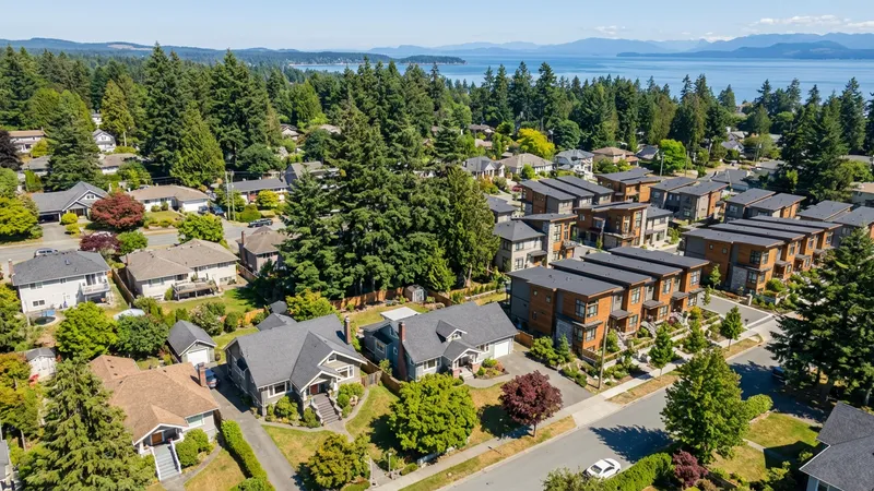 Aerial view of residential neighborhood near transit showing mix of housing types